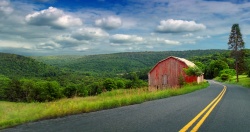 Pennsylvania Route 154 as it passes through the township with the Allegheny Plateau in the background