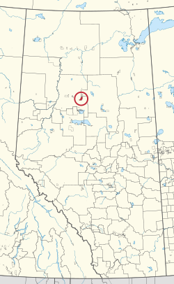 A map of the province of Alberta showing 80 counties and 145 small Indian reserves. One is highlighted with a red circle.